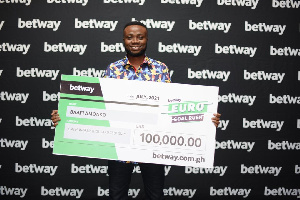 Adomako Baafi with his dummy cheque