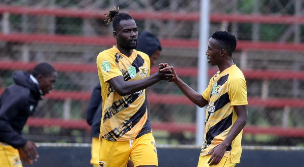 Anas Mohammed celebrates with a team mate