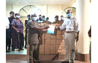 Chief Togbe Afede making the donation