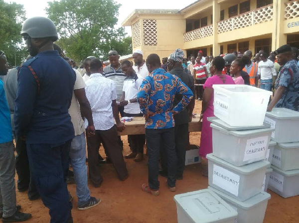 EC officials are counting the ballots