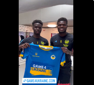 Thomas Partey (right) with teammate Bukayo Saka