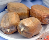 Kenkey is made from corn and covered with its leaves to give it a great fragrance