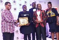 Staff of Man Capital receiving the award