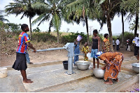 Residents using the borehole