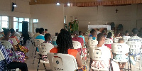 Reverend Father Dionisio Nellas addressing a congregation