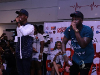 Medikal and Kofi Kinaata on stage