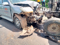 Ruins of Toyota Hilux pickup after a collision with a stationary truck on Sawla road