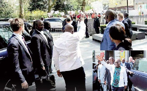 President Akufo-Addo waving at NDC demonstrators in London on Saturday