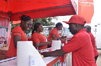 Some workers washing their hands during the event