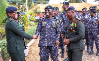 The IGP, Dr George Akuffo Dampare interacting with some senior officers of the Ghana Armed Forces