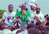 Haruna Iddrisu speaking to NDC members during the walk in Ketu North