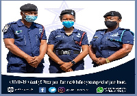 Police officers wearing nose masks