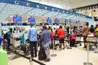 Passengers going through traveling formalities at the Kotoka Airport