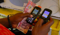 A mobile money agent approving a transaction