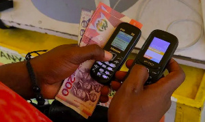 A mobile money agent approving a transaction