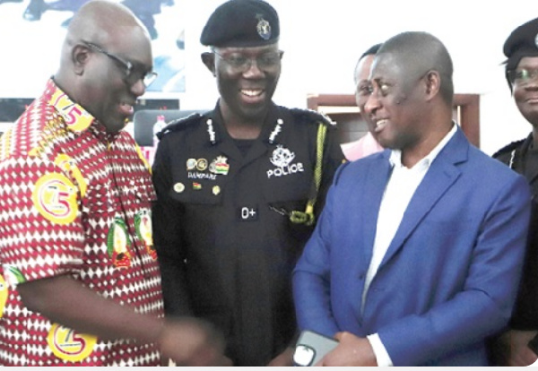 Dr. George Akuffo Dampare (middle) at a pre-May Day workers forum on Election 2024