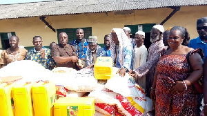 MCE for Jomoro Municipality, Ernest Kofie presenting some provisions to the Muslim community