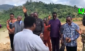 Clergymen praying at a galamsey site