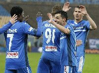 Francis Narh with teammates celebrating his goal