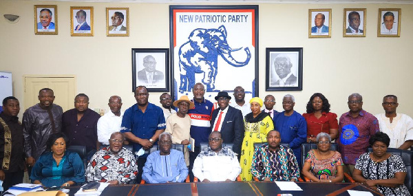 Members of the committee in a photo with executives of the NPP