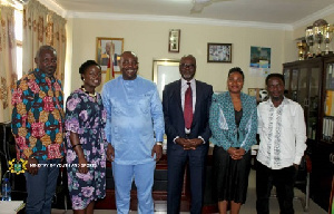 The Minister and his deputy with members of the Normalization Committee