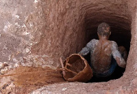 File Photo [Illegal miners at a site]