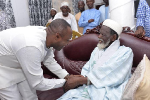 NPP's General Secretary, John Boadu in a handshake with Chief Imam,Sheikh Osmanu Nuhu Sharubutu