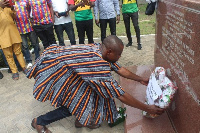 Deputy Sports Minister Evans Opoku Bobie lays a wreath at the May 9 monument