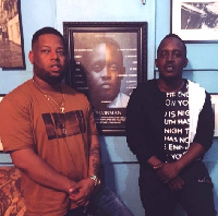 M.I Abaga pose for a photo with D Black