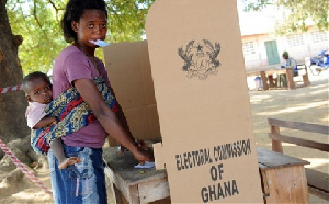 A citizen of Ghana casting her vote