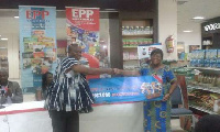 EPP presenting the money to the school