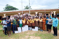 Students and officials take the group photograph after the presentation