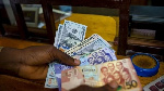 Cedi dips to GH¢14.18 against US dollar despite BoG intervention