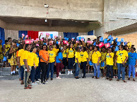 School girls who were given pads and members of the two NGO groups