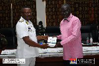 Professor Douglas Boateng presenting the books to the GAF