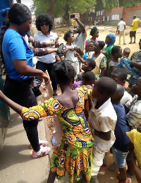 Representatives from KORLIBA Group with some of the street kids