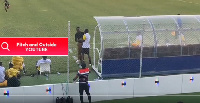 Coach Ignatius Osei-Fosu being pushed away by an official of King Faisal