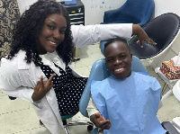 Shatta Bandle with his dentist, Dr. Louisa