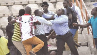 Fans pictured punching and beating a radio journalist