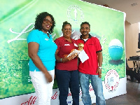 Mona sandwiched by lady captain (L) and sponsor, Burhan Captan