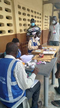 File Photo: Electoral officials at a polling station