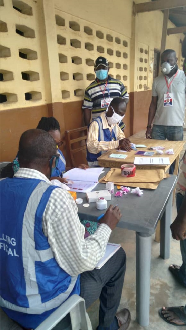 File Photo: Electoral officials at a polling station