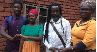 Alli Nansolo pictured center with wife Empress and their children, including Ishmael