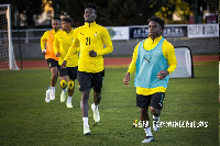 Tariq Lamptey (right) during training