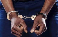 File photo of a person in handcuffs