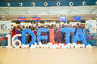 Staff of Delta Airlines pose for a group photo at KIA