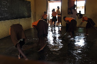 File: Some students cleaning their classroom