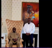 Otumfuo Osei Tutu II (seated) and Dr Kwaku Oteng