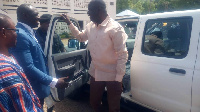 The Regional Minister handing over the pickup to the police