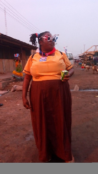 Ms Janet Manu in her school uniform, and a kalyppo drink in hand.